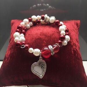 Elegant Red and White Beaded Bracelet with Heart Charm
